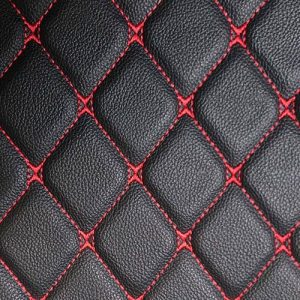 Meterware in schwarz mit roten Nähten